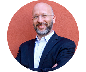 Circular headshot of Aaron Ghirardelli